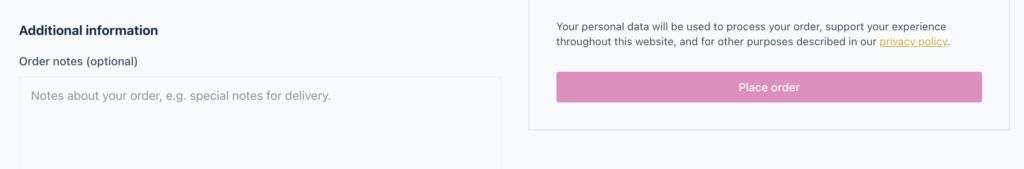Partial view of a form with a pink button on the right side.